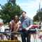 DJ Kim Owens from Son of Man and DJ Rob Salvati playing at a poor boy's lunch.