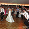 The wedding party gives their guests a show with streamers